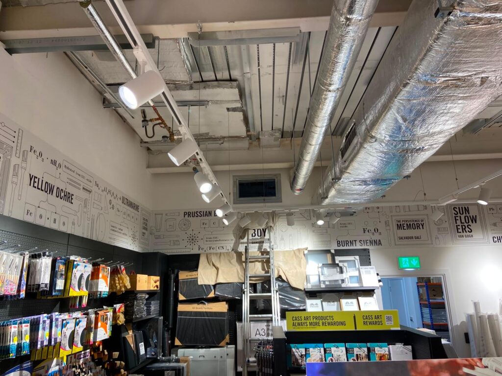 Commercial air conditioning installation with exposed ductwork
