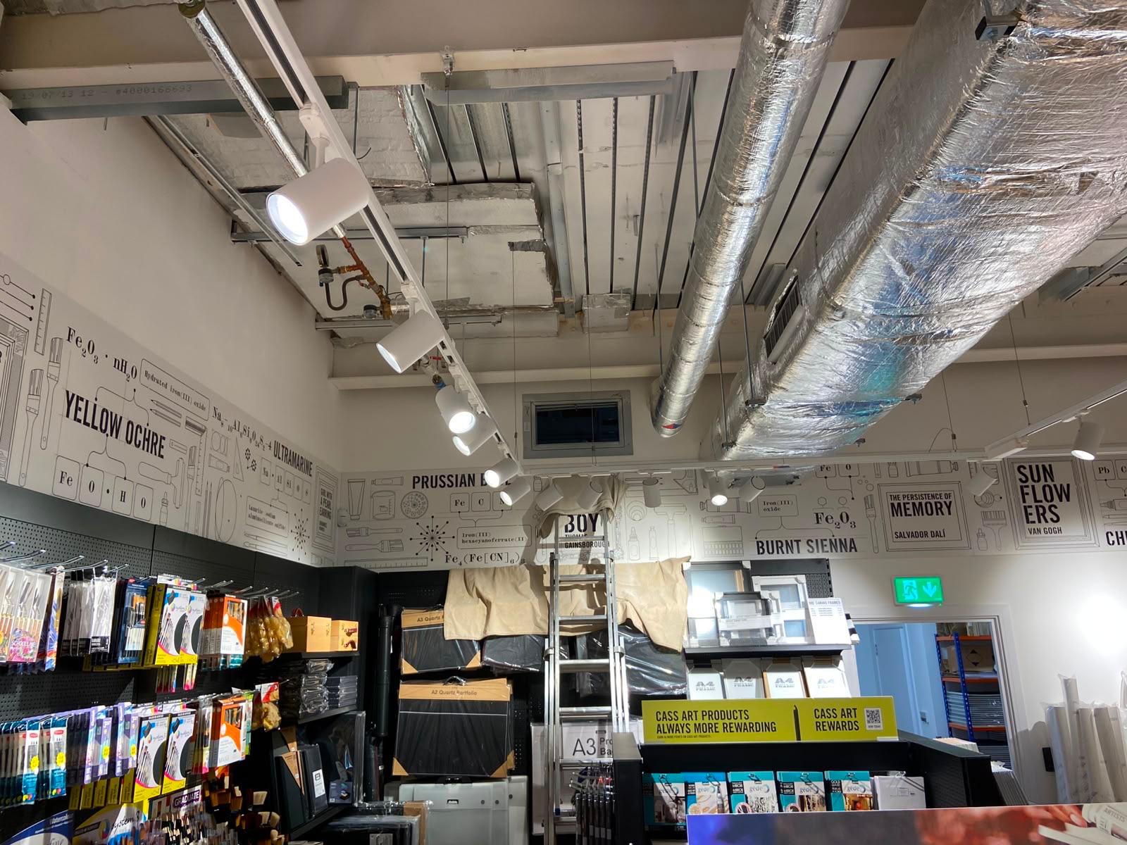 Commercial air conditioning installation with exposed ductwork
